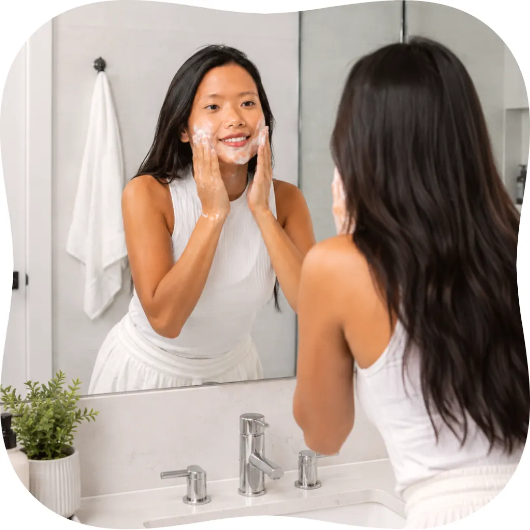 A patient washing her face at home